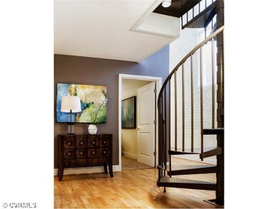 Foyer - elegant foyer with spiral stairs