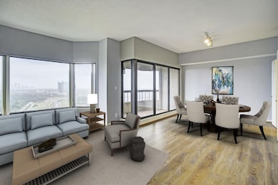 Living and dining room virtually staged.