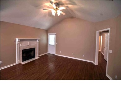 living area with vaulted ceilings