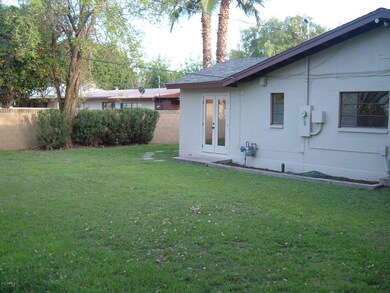 Bonita cross lot view of back yard
