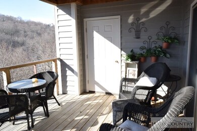 The back deck is spacious and has an additional private storage area.