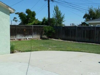 Back yard.  Detached garage in rear with long driv