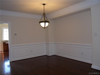 Dining Room: Hardwood Floors, Exquisite Crown Mold