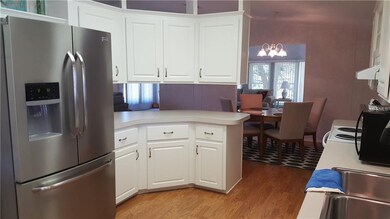 Kitchen with Stainless Fridge and lots of storage 