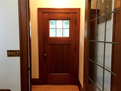 Enter through leaded glass door into lovely foyer