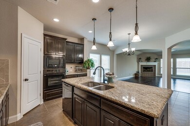 Kitchen featuring a healthy amount of sunlight, a 