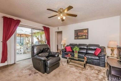 Family room with slider to private side patio