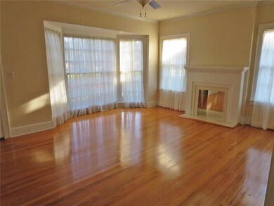 Living room with decorative fireplace