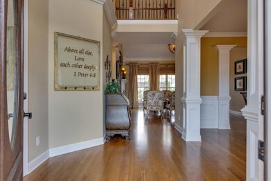 Impressive entryway with interesting angles and dividing columns