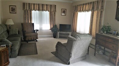 View of 1st floor living room from front entrance