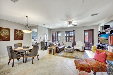 Living room featuring light tile patterned floorin