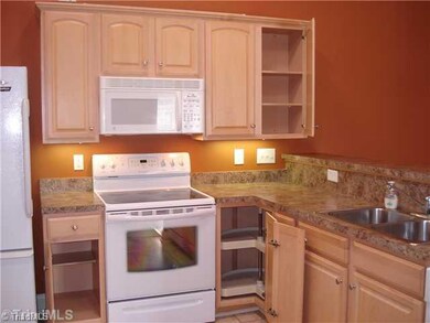 Kitchen. Inviting, comfortable rennovated Milhaven Landing home with brand new gleaming hardwood floors, vaulted ceiling, marble fireplace, and beautifully manicured grounds priced below tax value provide immediate built in equity.