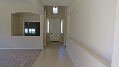 View from entryway into the formal living room on