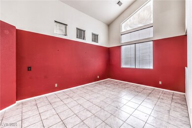 Empty room with visible vents, baseboards, and a h