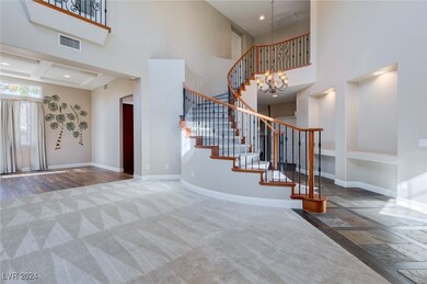 Gorgeous, well-lit living room with new carpet, ti