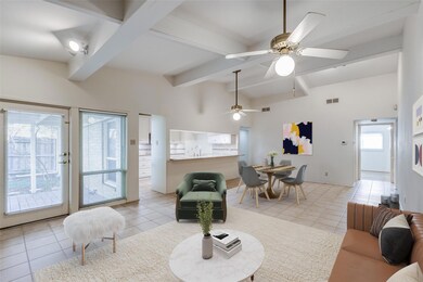 Digitally staged view from fireplace toward kitche