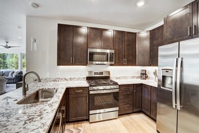 Kitchen featuring  stainless steel appliances, lux