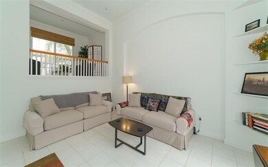 Living room showing the loft/sitting area overlook