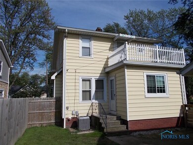 back view of home w/ new central air