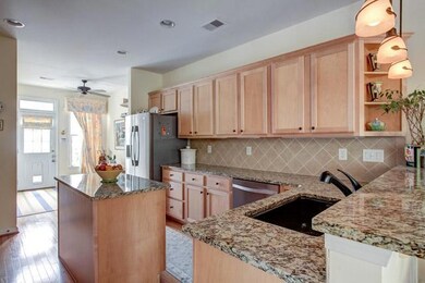 Because this home is an end unit and has plenty of windows, you’ll enjoy lots of natural light, views of nature and even charming window boxes.