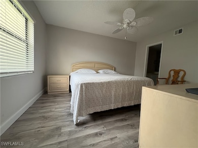 Bedroom featuring light wood-style flooring and a