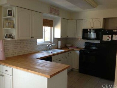 Remodeled kitchen with butcher block countertops a