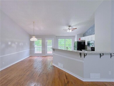 Kitchen with a kitchen breakfast bar, visible vent