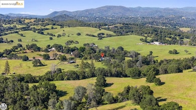 Bird's eye view featuring a rural view and a mountain view