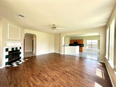 Spacious family room featuring a charming double-s