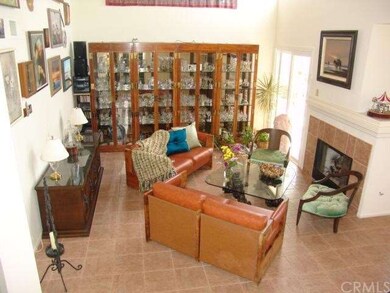 large living room with fireplace and sliding doors