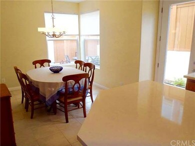 Spacious dining area open to kitchen with plenty of natural light
