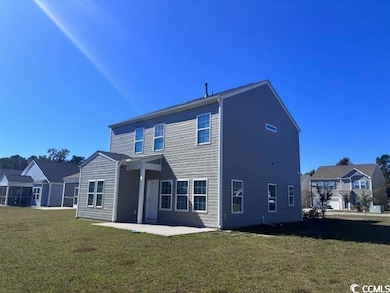 Rear view of property with a patio area, a lawn, and a residential view