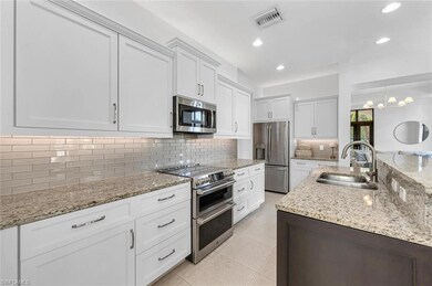 Kitchen featuring appliances with stainless steel 