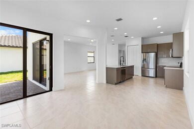 Kitchen featuring appliances with stainless steel