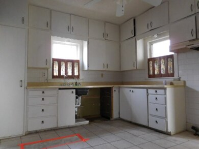 LOADS OF CABINETS AND STORAGE. TALL CEILINGS