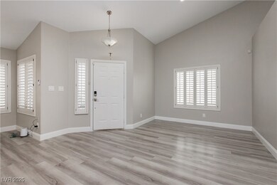Foyer entrance with a wealth of natural light, bas