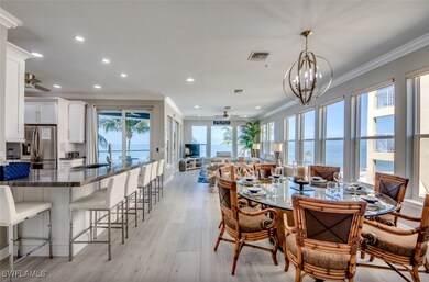 Dining area featuring sink, crown molding, ceiling