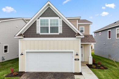 The exterior is completed with sod and features Hardie board on the front!