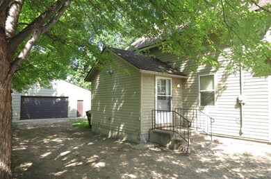 The side entrance leading into the laundry/mudroom