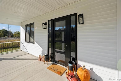 Doorway to property with a porch
