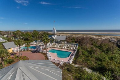 Aerial view of the 2 pools, pavillion & private bo