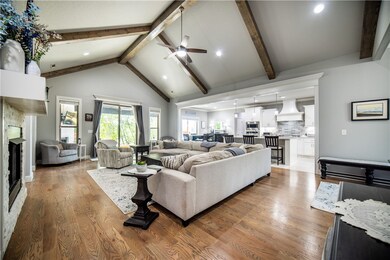 Vaulted open living room and kitchen