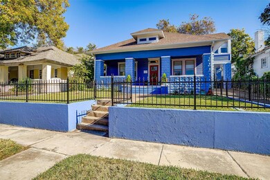 View of front of property with a front yard