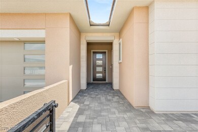 Doorway to property with a balcony