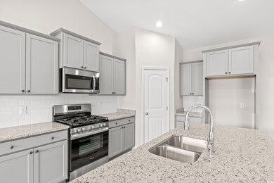 Kitchen featuring appliances with stainless steel 