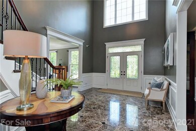Dramatic Marble Floored Foyer, 20' Ceilings Welcom