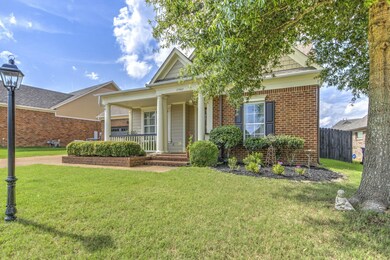 View of front of home featuring covered porch and 