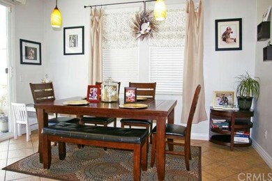 Dining area measures 13'8