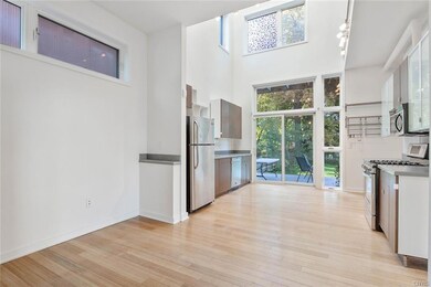 A living or dining area followed by the kitchen an