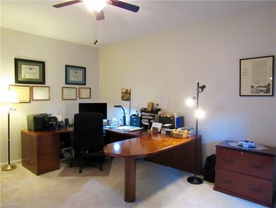 There is nice space in the den, which  is tucked i